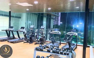 a gym with a bunch of tread machines in a room at Lavile A-Z Property Management Service @ welcome pm for more info in Kuala Lumpur