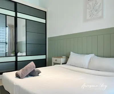 a bedroom with a white bed with a large window at Arte Plus Ampang By Awesomestay in Kuala Lumpur